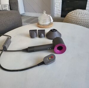 Dyson Hair Dryer with Purple and Gray Accents, 3 Original Attachments.